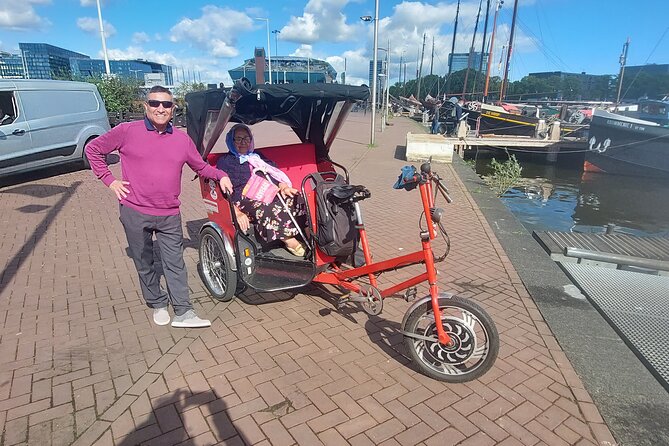 1 Hour Private Amsterdam Rickshaw Tour - The rickshaw ride: private pace, WiFi, and practical comfort