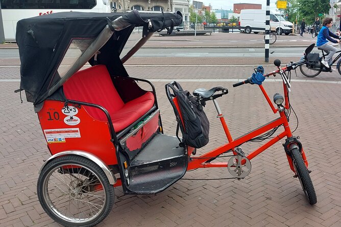 1 Hour Private Amsterdam Rickshaw Tour - Weather and comfort: plan for rain, wind, and street heat