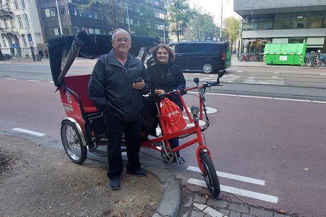 2 Hours Private Amsterdam Rickshaw Tour - Anne Frank House Area: A Serious Stop in a Moving Day