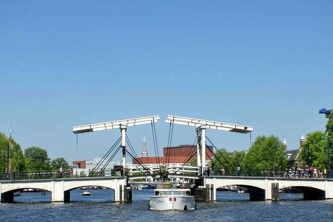 5 hrs Golden Age Amsterdam Private Walking Tour With Local Guide - From the smallest house to the Waag: canals, guild power, and narrow-city living