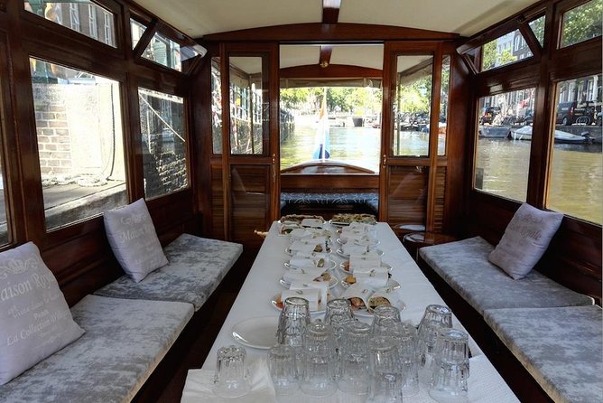 A unique experience! Semi private cruise. Authentic stylish boat! Book Leemstar! - Passing the Anne Frank House area by canal: respectful, scenic, and quick