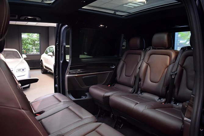 Airport or Port transfer Business Class (private car service) - Business-Class comfort: Wi‑Fi, a spacious car, and the driver factor