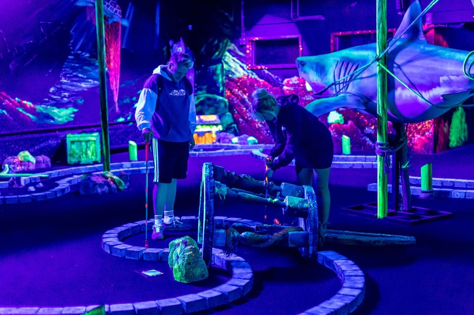Aloha Amsterdam: 12-Hole Glow-in-the-Dark Mini-Golf - Pirates on Ships Meets Underwater Under Blacklight