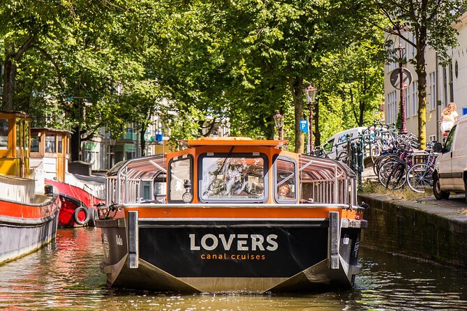 Amsterdam 1h Canal Cruise by Semi-Open Boat with Audio Guide - The Singel Canal: A Quiet “In-Between” You’ll Appreciate