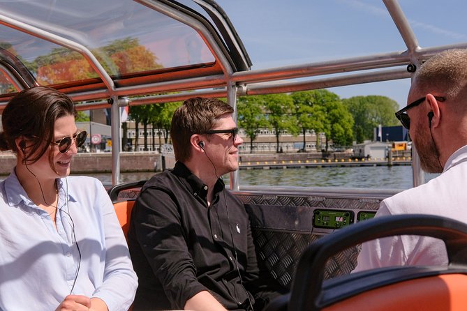 Amsterdam 1h Canal Cruise by Semi-Open Boat with Audio Guide - Hermitage and the Rijksmuseum Area: Museums Seen at Water Level