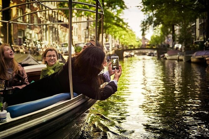 Amsterdam 2-hour Private Canal Cruise with Live Guide and Drinks - Entering the canal world from Prinsengracht 375