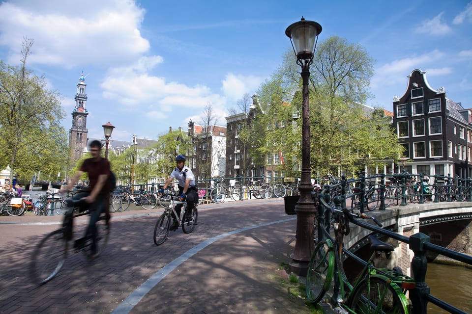 Amsterdam: 3-Hour Private Bike Tour of the City Center - Meeting point at Oosterdokskade 63A: what to plan for