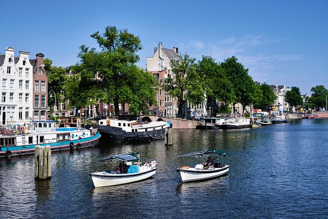 Amsterdam: 60-Minute Guided Private Canal Cruise with Drinks - UNESCO Canal Belt: Golden-Age Stories You Can Actually Picture