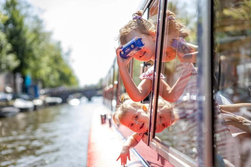 Amsterdam: 75 Minute City Canal Cruise with Audio Guide - Magere Brug and the Museums Quarter: Culture from a Moving Window