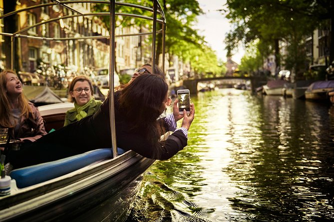 Amsterdam 90-min Private Canal Cruise with Live Guide and Drinks - Setting Off From Prinsengracht for a Calm 90 Minutes