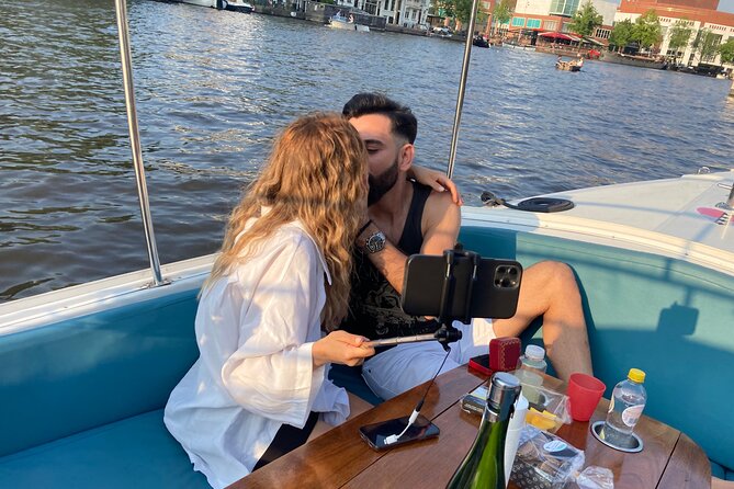 Amsterdam 90-min Private Canal Cruise with Live Guide and Drinks - UNESCO Canal Belt Highlights: Golden Age Stories on Water