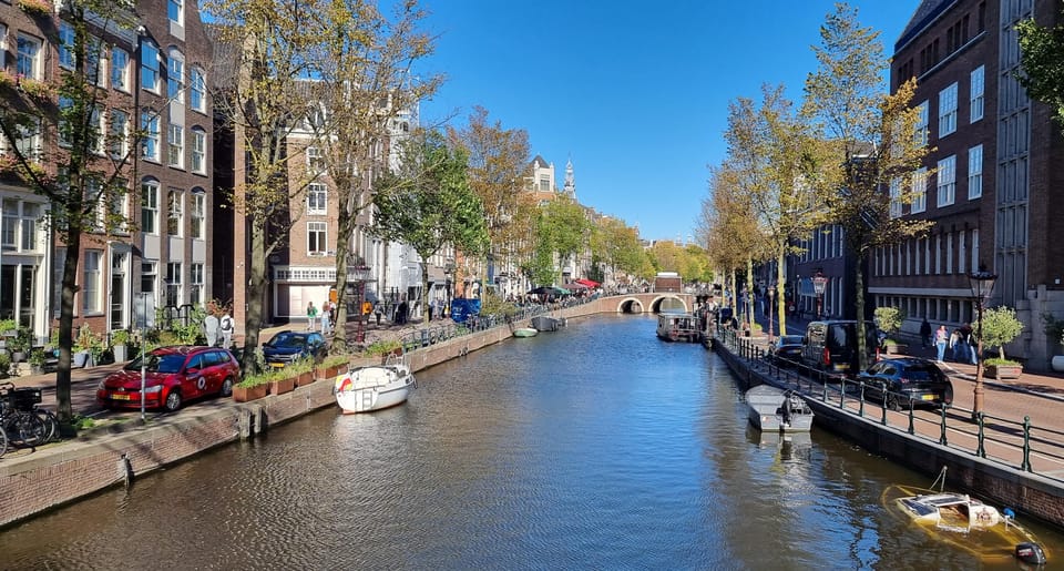 Amsterdam All In One Tour Walking Tour - Dam Square and the Royal Palace Area: Where You Start Feeling Amsterdam