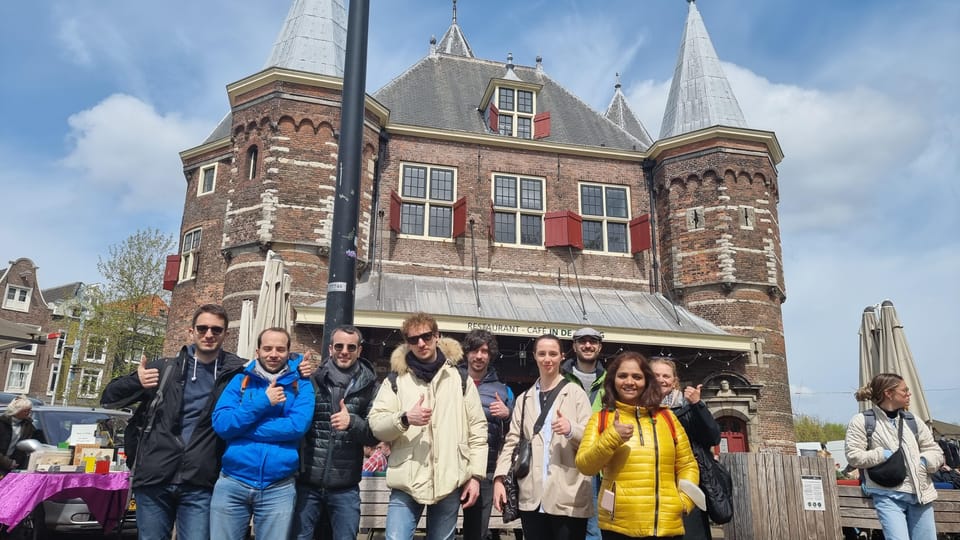 Amsterdam All In One Tour Walking Tour - Meeting Up With the White Umbrella and the 10-Minute Window