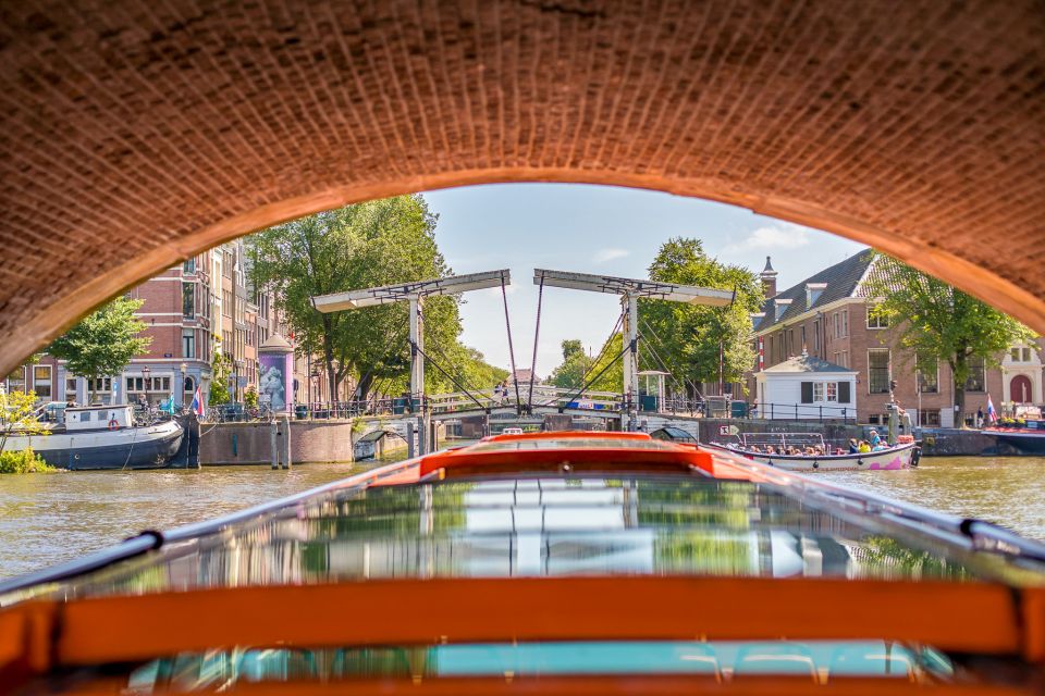 Amsterdam: Body Worlds Exhibition and Canal Cruise - Inside the museum: happiness, health, and real anatomy