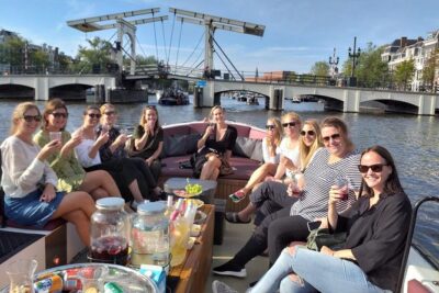 Amsterdam canal cruise in open boat – Guided tour - Central Station Front: The Modern Amsterdam Layer