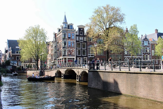 Amsterdam Canal Tour by Open Boat – 90 min Small Group Experience - “Seven Bridges” Vibes At Reguliersgracht: A View That’s Built For The Water