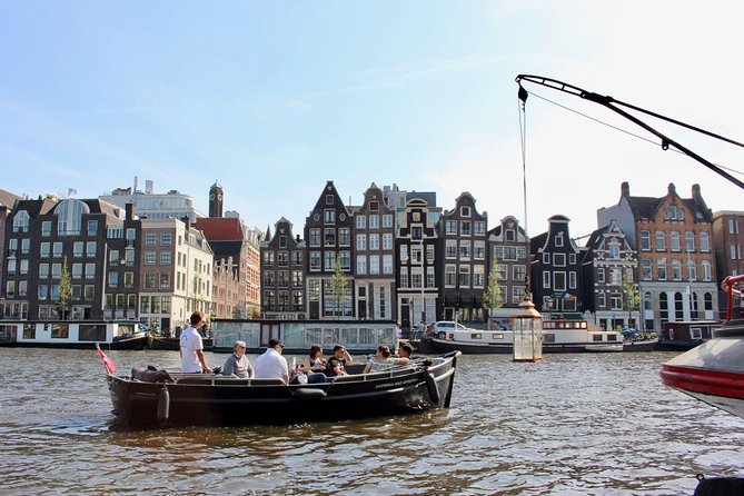 Amsterdam Canal Tour by Open Boat – 90 min Small Group Experience - Small Open Boat Comfort: Why Blanks And Rain Coverage Matter