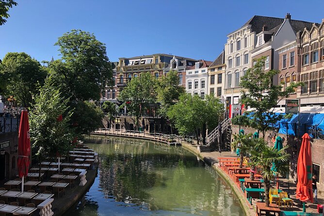 Amsterdam Castle & Utrecht City - Private Day Tour - Utrecht Dom Tower and city center: canals, medieval layers, and the Dutch Republic connection