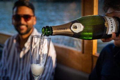 Amsterdam Champagne Private Canal Cruise - The Boat and Crew Vibe: Classic Wooden Comfort, Not a Factory Tour