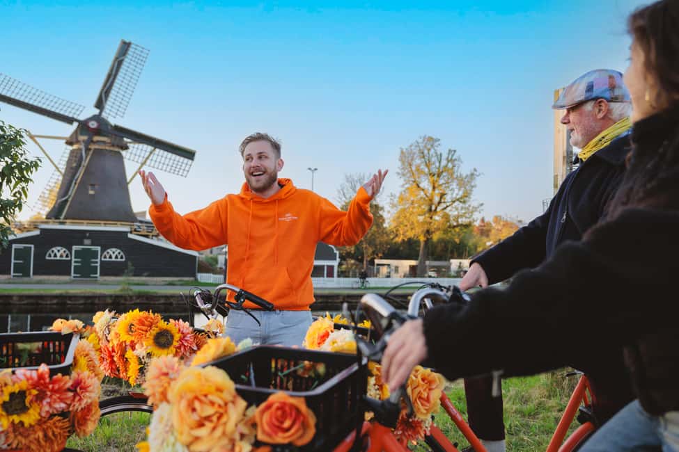 Amsterdam: Cheese, Windmill & Countryside Bike Tour - Meeting at Central Station and finding your orange guide