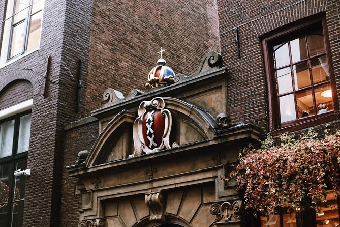 Amsterdam City Center & History - Exclusive Guided Walking Tour - Stop-by-stop: Amsterdam’s churches, canal gates, and the water behind it all