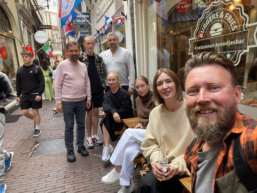 Amsterdam: City Highlights Walking Tour - Walking the Amsterdam Center Line: From Centraal to Dam Square