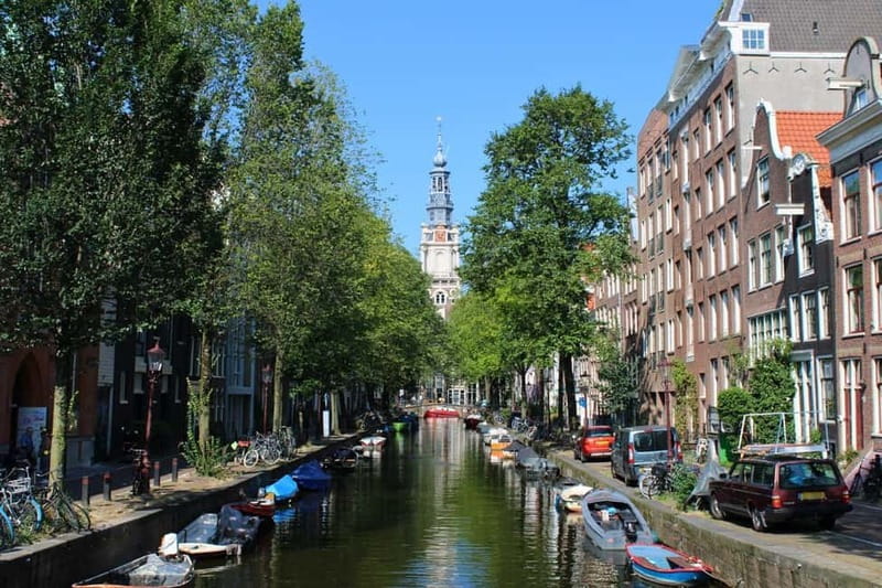 Amsterdam: City walking experience with a local - Key highlights to expect