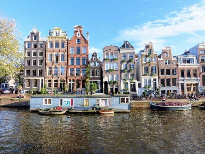 Amsterdam: City walking experience with a local - Meeting at Beursplein: the easiest way to get your bearings