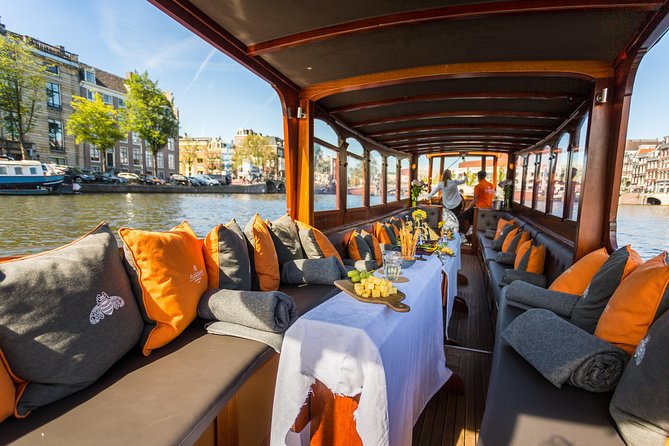Amsterdam Classic Saloon Boat Cruise with Drinks and Cheese - Getting to the right place: two departure points and a central start