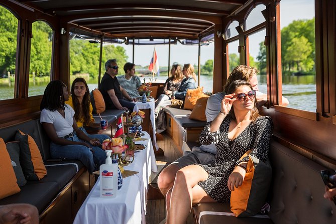Amsterdam Classic Saloon Boat Cruise with Drinks and Cheese - Cheese, mustard, and unlimited drinks: what you’re really paying for