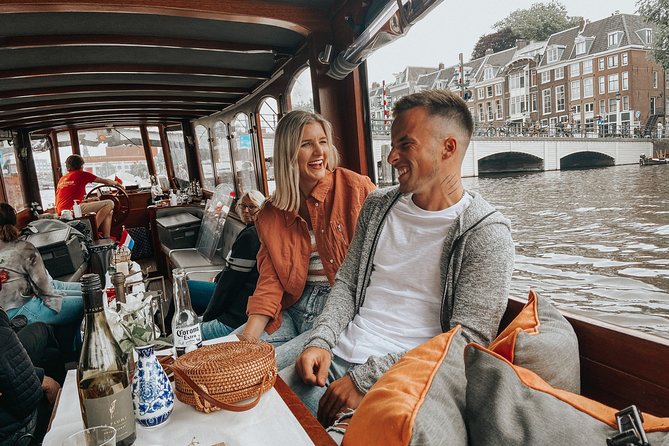 Amsterdam Classic Saloon Boat Cruise with Drinks and Cheese - Comfort, crowds, and the reality of covered windows
