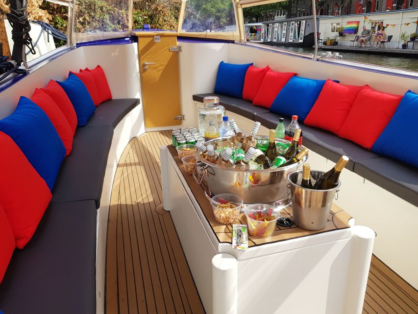 Amsterdam: Covered Canal Booze Cruise with Unlimited Drinks - The 1-hour route: Red Light District views to the Seven Bridges moment