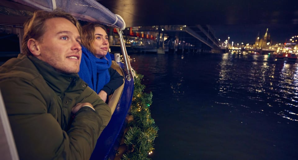 Amsterdam: Cozy Evening Canal Cruise With Open Bar Option - Weather-proofing: covered boat and blankets actually matter