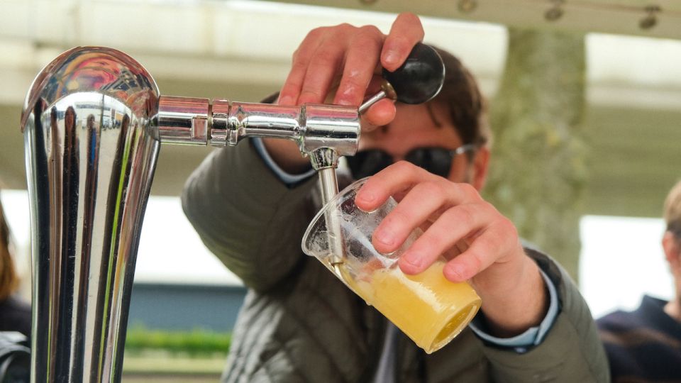 Amsterdam: Dutch Beer Bike Blast Tour with Onboard Bar - Safety and Comfort: Rain Protection, Lighting, and How It Feels in Real Life