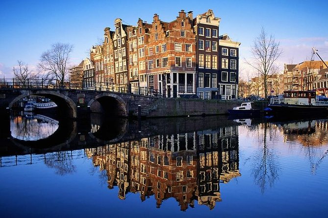 Amsterdam: E-Bike Sightseeing Tour - Amsterdam Centraal Finish: Wrap-Up Photos and a Smooth Return