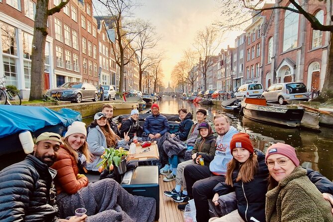 Amsterdam Evening Cruise in Small Group - Skinny Bridge and the wooden-bridge moment at night