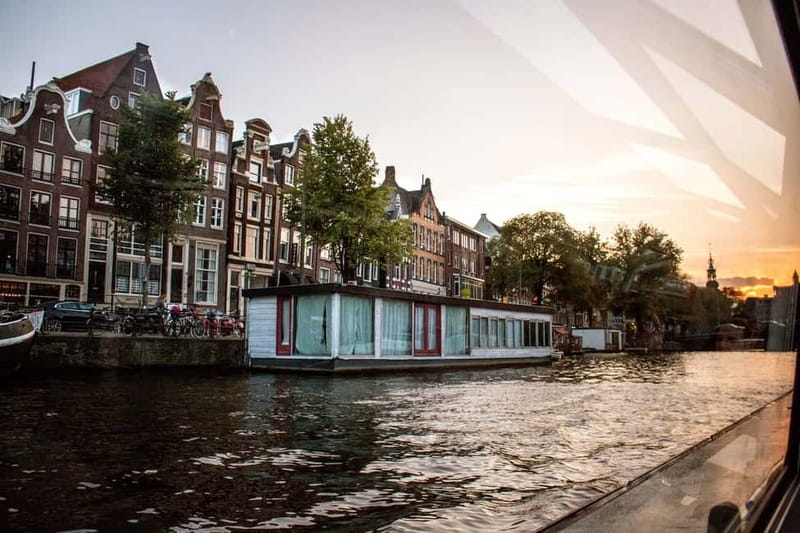 Amsterdam: Evening Pizza Cruise Along the Canals - Heated Comfort, Wi‑Fi, and Bathroom Access