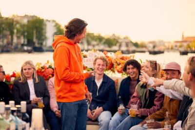 Amsterdam: Exclusive Tulip Tour Canal Cruise - Oosterdok and the harbor-to-canal mood shift