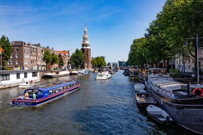 Amsterdam Family-Friendly Canal Cruise with Snackbox Option - Major landmarks from the water: Westerkerk and Amsterdam Centraal