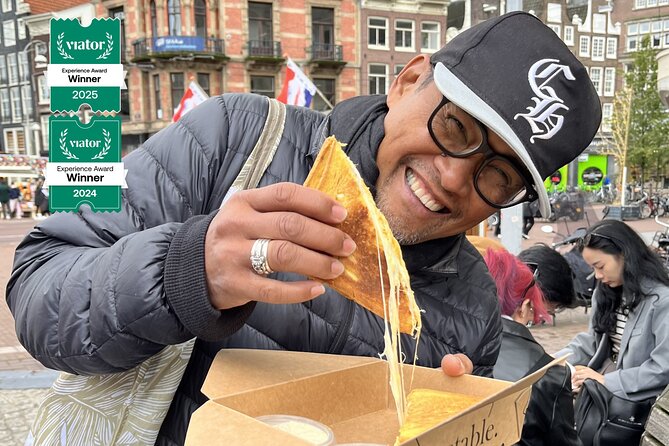 Amsterdam Food and Cultural Tour with Tastings - Torensluis and the Crooked-House Stories: Why Amsterdam Looks the Way It Does