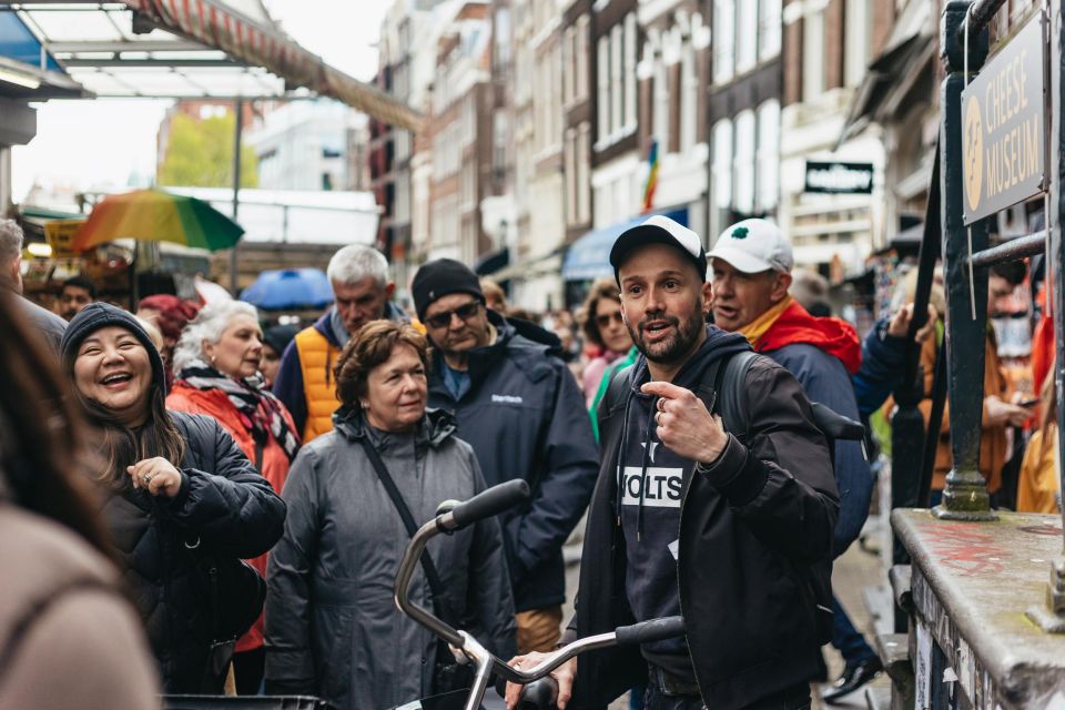 Amsterdam: Food and Culture Walking Tour with Tastings - Begijnhof and the Royal Palace: famous sights with food-world context