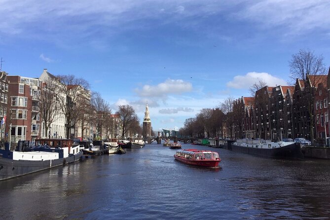 Amsterdam full day tour: Walking, Biking and Cruising - Nieuwezijds Voorburgwal bike setup: making the most of 2.5 hours on two wheels