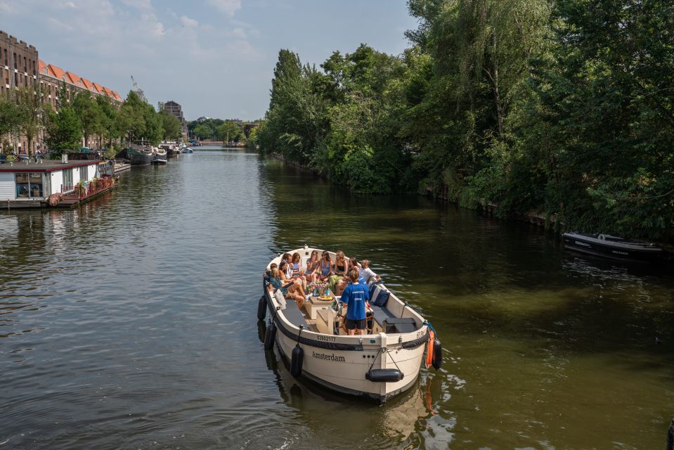Amsterdam: German Guided Canal Cruise with on Board Bar - Electric boat + on-board bar: comfortable without feeling like a party boat