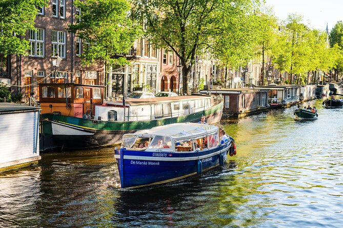 Amsterdam: German-speaking boat trip with bar on board - Key highlights worth your time