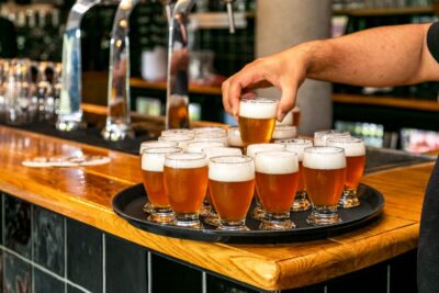 Amsterdam: Guided Craft Beer Brewery Bus Tour with Tastings - Getting There: Overhoeksplein, the Ferry, and Finding the Yellow Shirt