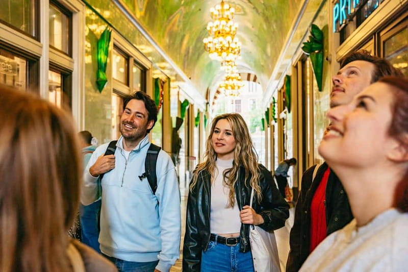 Amsterdam: Guided Cultural Walking Tour - Multatuli’s colonial-era angle and the tiniest house moment