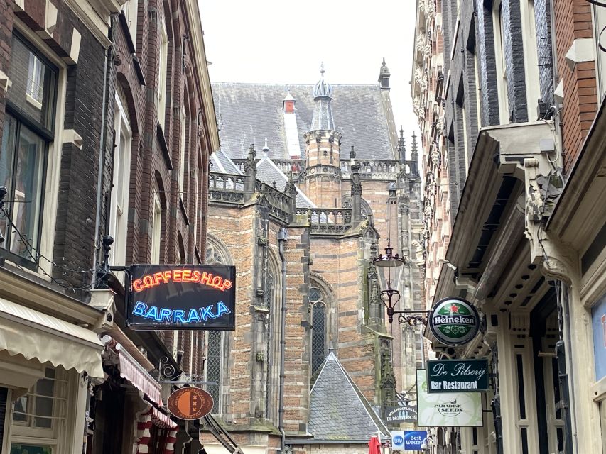 Amsterdam: Guided Off-The-Beaten-Track Walking Tour - Torensluis and the canal belt: why the city is shaped like this