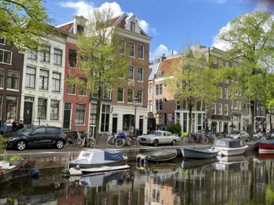 Amsterdam: Guided Off-The-Beaten-Track Walking Tour - Dam Square: Royal Palace, National Monument, and Nieuwe Kerk with meaning