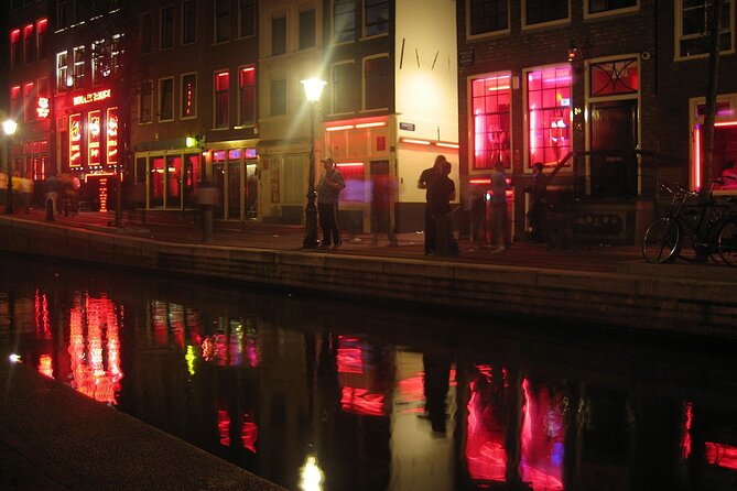 Amsterdam: Guided Red Light District and City Walking Tour - Condomerie stop: a modern storefront with a long neighborhood reputation