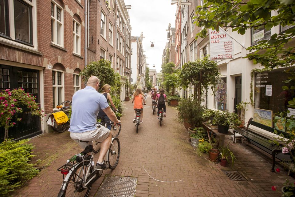 Amsterdam: Hidden Gems & Highlights Guided Bike Tour - Vondelpark cycling: easy paths and a breath of green